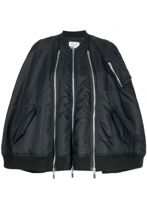 Noir Kei Ninomiya zipped padded cape - Black