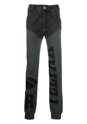 Telfar panelled logo-print trousers - Black