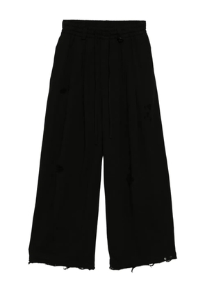 TEAM WANG design distressed track pants - Black