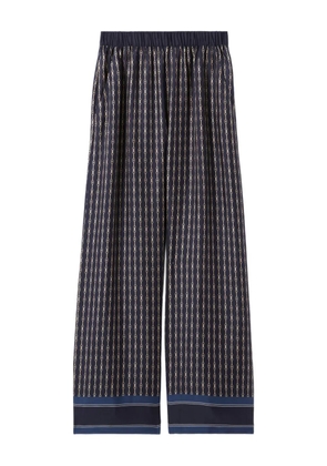 Claudie Pierlot horsebit-patterned trousers - Blue