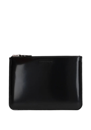 Comme Des Garçons Wallet logo-debossed leather clutch bag - Black