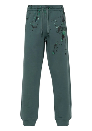 Moschino logo-print track pants - Green