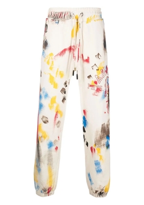 Palm Angels paint-splatter logo-print track pants - Neutrals