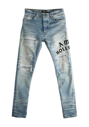 AMIRI distressed embroidered jeans - Brown