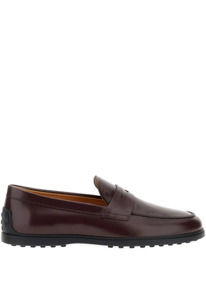 Tod's monogram-embossed loafers - Brown