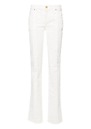 Blumarine raw-cut detailed slim-leg trousers - White