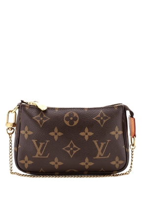 Louis Vuitton Pre-Owned Pochette Accessoires Monogram Canvas Mini clutch bag - Brown