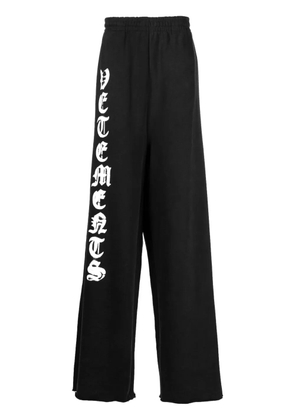 VETEMENTS logo-print cotton track pants - Black