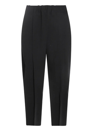Issey Miyake pleated tapered trousers - Black