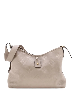 Louis Vuitton Pre-Owned CarryAll Monogram Empreinte Giant MM hobo bag - Neutrals
