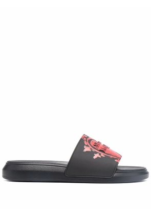 Alexander McQueen embossed logo slides - Black
