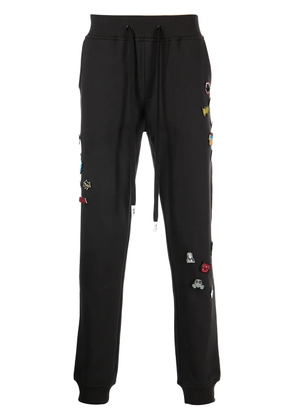 Haculla decorative-pin detail track pants - Black