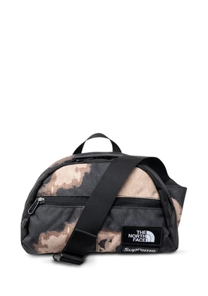 Supreme x The North Face Roo II bleached denim-print bag - Brown