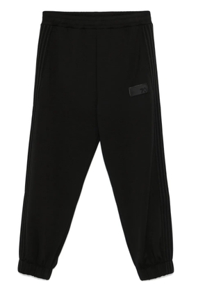 Ea7 Emporio Armani rubberised-logo track pants - Black