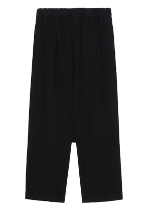 Black Comme Des Garçons drop-crotch trousers