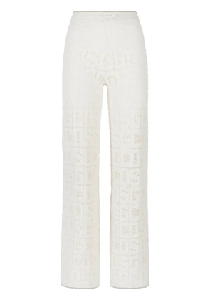 GCDS monogram crochet-knit trousers - White