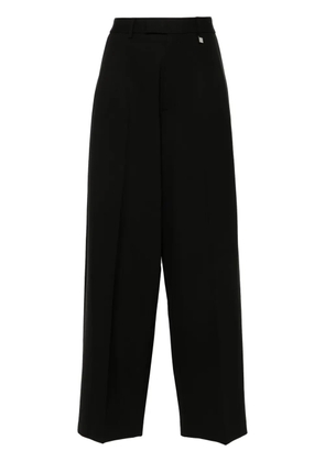 Giuseppe Di Morabito logo-plaque trousers - Black