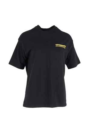 VETEMENTS logo-print oversized T-shirt - Black