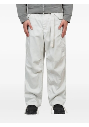 sacai cargo-pocket trousers - White
