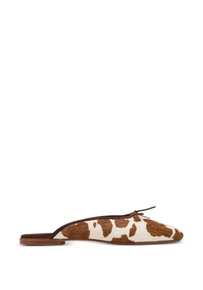 SOPHIQUE Poesia cow-print mules - White
