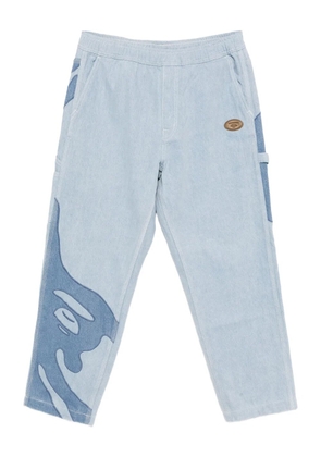 AAPE BY *A BATHING APE® logo-patch trousers - Blue