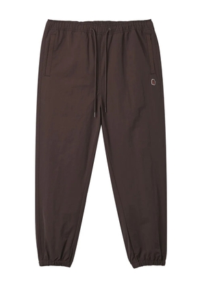 FINGERCROXX logo-patch elasticated trousers - Brown