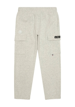 AAPE BY *A BATHING APE® cargo-pocket logo-patch trousers - White