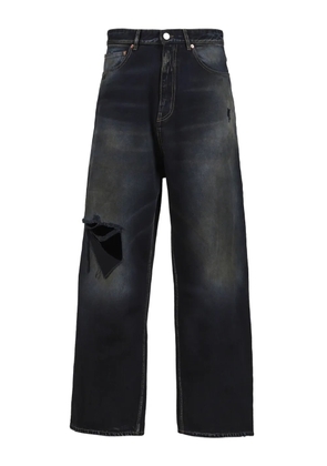 VETEMENTS distressed wide-leg trousers - Black