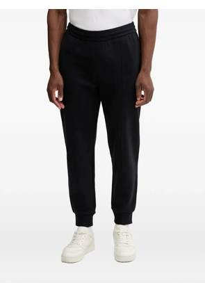 Armani Exchange logo-plaque trousers - Black