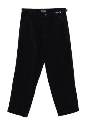 izzue logo-patch trousers - Blue