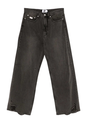 izzue logo-patched jeans - Black