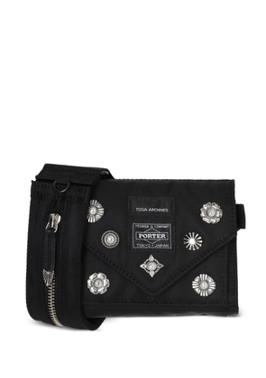 Toga stud-embellished messenger bag - Black