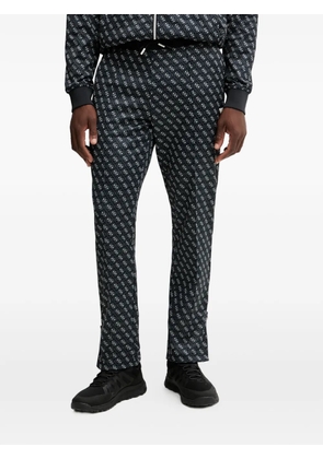 GUESS USA logo-print trousers - Black