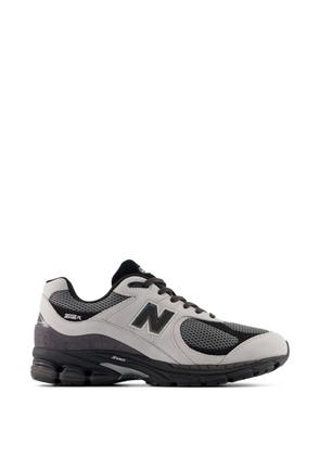 New Balance U2002R logo-patch sneakers - Grey