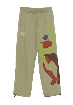 KidSuper motif-appliqué trousers - Green