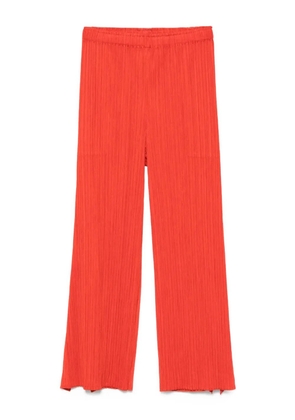 Pleats Please Issey Miyake plissé elasticated trousers - Red