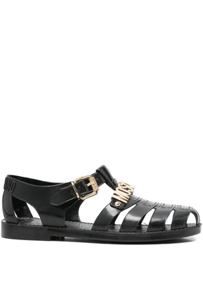 Moschino logo-plaque buckle sandals - Black