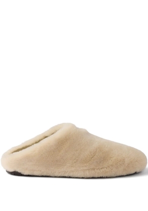 Prada triangle-logo shearling mules - Neutrals