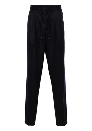 Brunello Cucinelli mid-rise tapered trousers - Blue