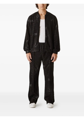 Needles web-print track pants - Black