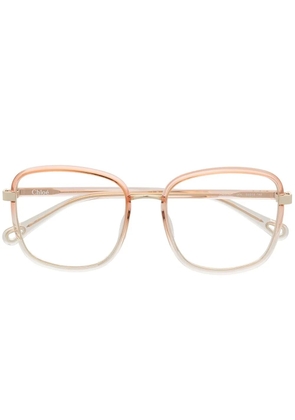 Chloé Eyewear oversize transparent-effect glasses - Orange