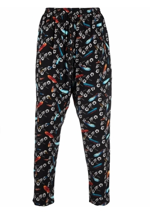 COUNTY OF MILAN graphic-print pleated track pants - Black