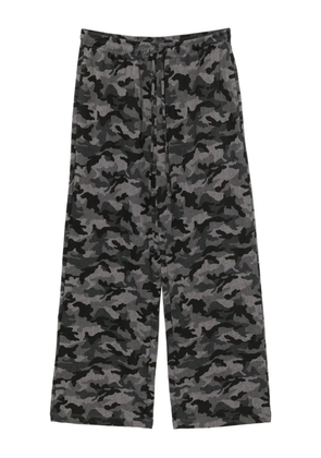 b+ab camouflage-print trousers - Black