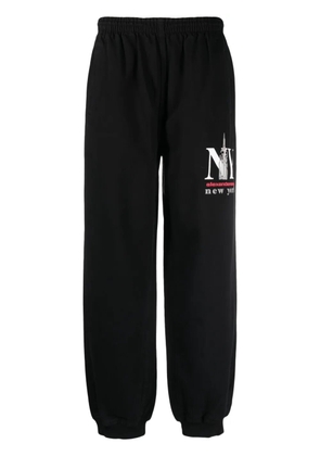 Alexander Wang logo-print cotton-blend track pants - Black