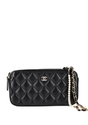 CHANEL Pre-Owned quilted leather zip-fastening wallet - Black