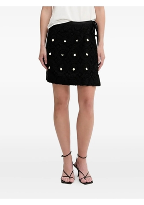 NEVER FULLY DRESSED crochet-detail wrap mini skirt - Black