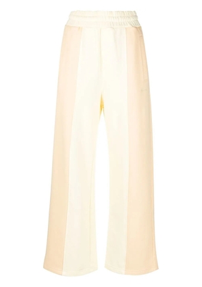 AMBUSH panelled cotton-jersey sweatpants - Yellow