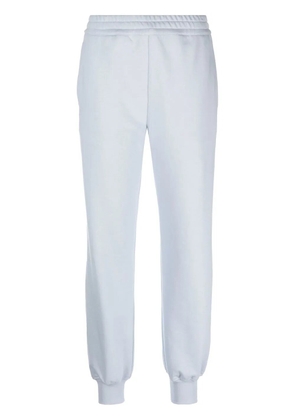 Alexander McQueen logo-print track pants - Blue