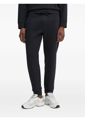 Armani Exchange logo-embroidered track pants - Blue