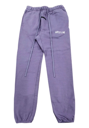 FEAR OF GOD ESSENTIALS slogan-print track pants - Purple